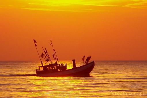 sunset; sea; fishing boat