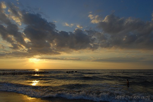 sunset; clouds; sea; breakwater