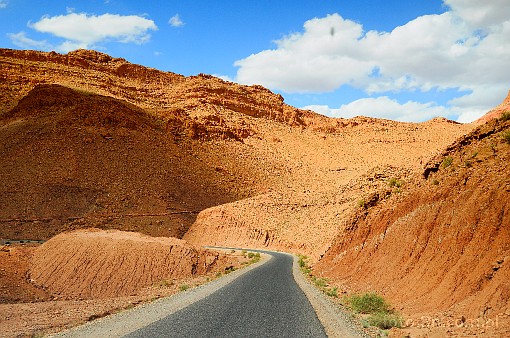 Africa; Morocco; Atlas; mountains; road; clouds; turn; mountain road