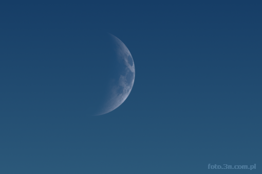 moon; waxing crescent; blue sky